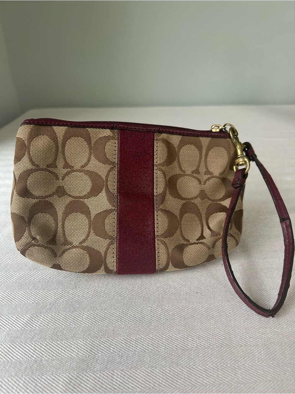 Coach Signature Canvas Wristlet in Tan with Burgundy Stripe